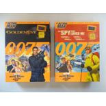 A pair of limited edition ACTION MAN figures associated with the James Bond films Goldeneye and