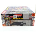 A pair of CARRERA Movie Tie-In Slot Racing Sets comprising: Marvel X-Men and James Bond Casino