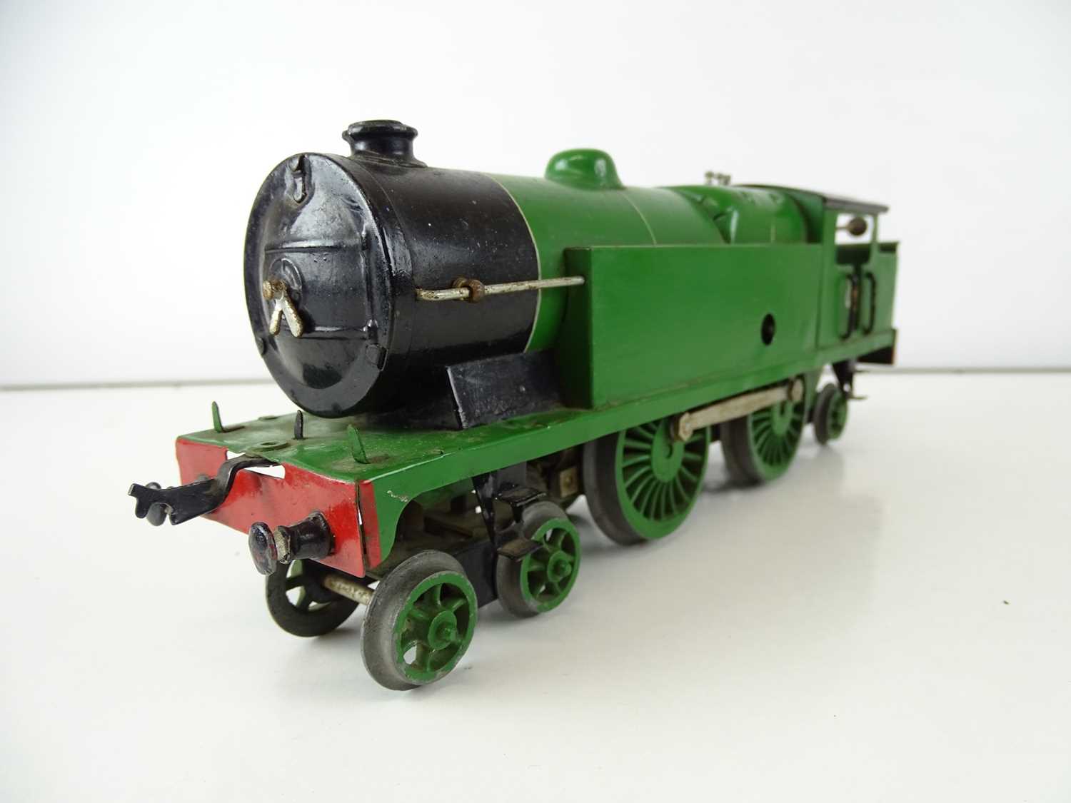 A HORNBY O Gauge clockwork No.2 4-4-2 steam locomotive repainted in green livery - F/G in plain box