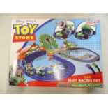 A MICRO SCALEXTRIC Toy Story slot racing set, appears complete as new - VG/E in VG box