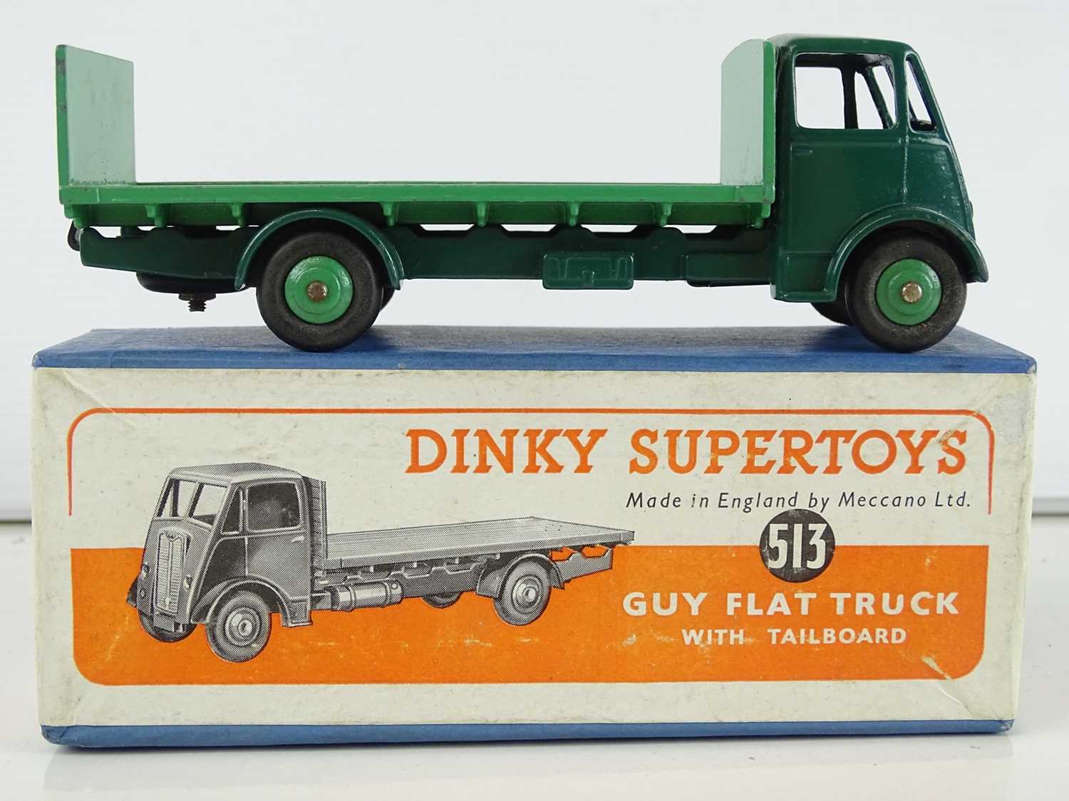 A DINKY Supertoys 513 Guy Flat Truck with Tailboard - dark green cab and chassis and mid-green - Image 3 of 5