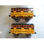 A pair of Hornby 3.5 inch scale G104 coaches as issued for the live steam Rocket - name transfers