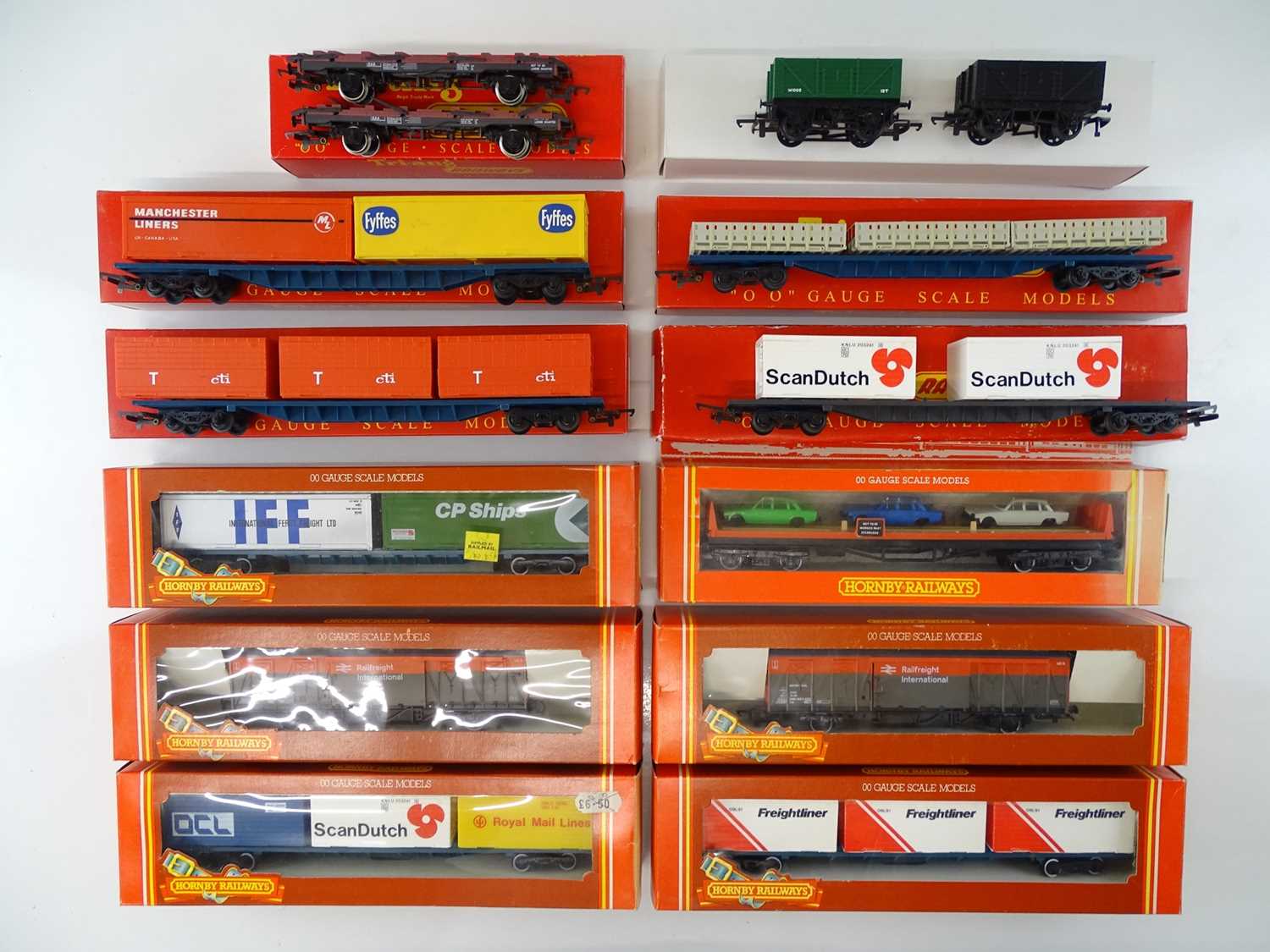 A quantity of TRI-ANG and HORNBY OO Gauge container wagons, vans etc as lotted, some in repro