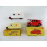 A pair of DINKY 253 Daimler Ambulances in cream and white (one boxed), together with a restored