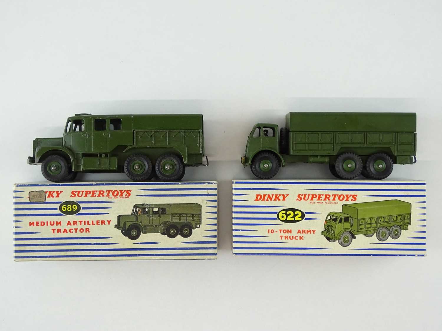 A pair of DINKY military vehicles comprising a 622 Army Truck and a 689 Medium Artillery Tractor -