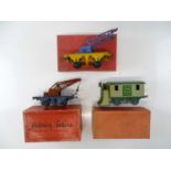 A group of HORNBY SERIES O Gauge pre-war wagons to include 2 crane trucks and a snow plough (full