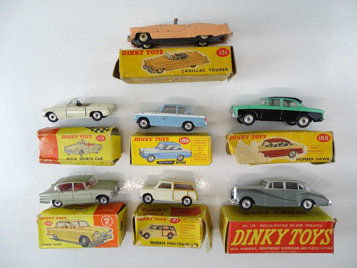 A group of DINKY cars as lotted - F/G in P/F boxes (7)