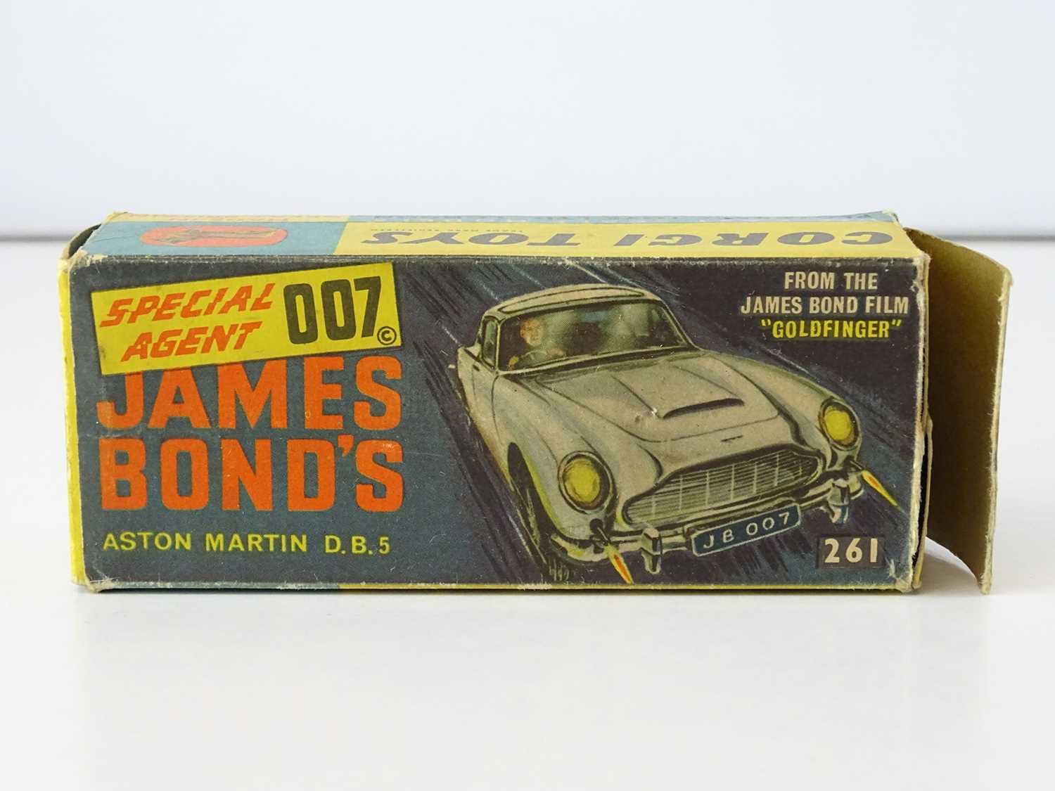 A CORGI Toys 261 James Bond's Aston Martin in gold with working bullet shield, guns and ejector seat