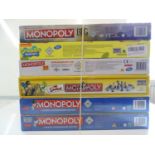 A group of Monopoly sets, all sealed as new, to include London Underground, Minions, The Simpsons