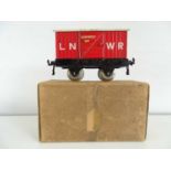 An early HORNBY SERIES O Gauge gunpowder van in LNWR red livery with T1 chassis - G in G box