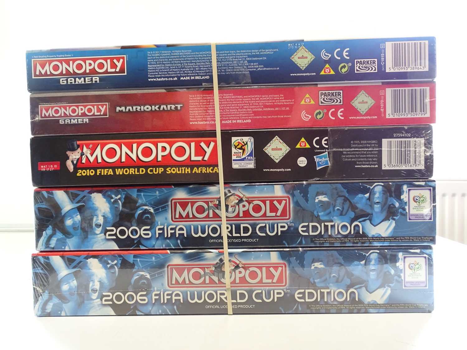A group of Monopoly sets, all sealed as new, to include FIFA and Mario editions - VG/E in VG
