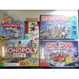 A group of Monopoly sets, all sealed as new, to include World, City and Hotels editions - VG/E in VG