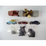 A mixed group of unboxed DINKY and CORGI items to include a large quantity of spare tyres - F/G (