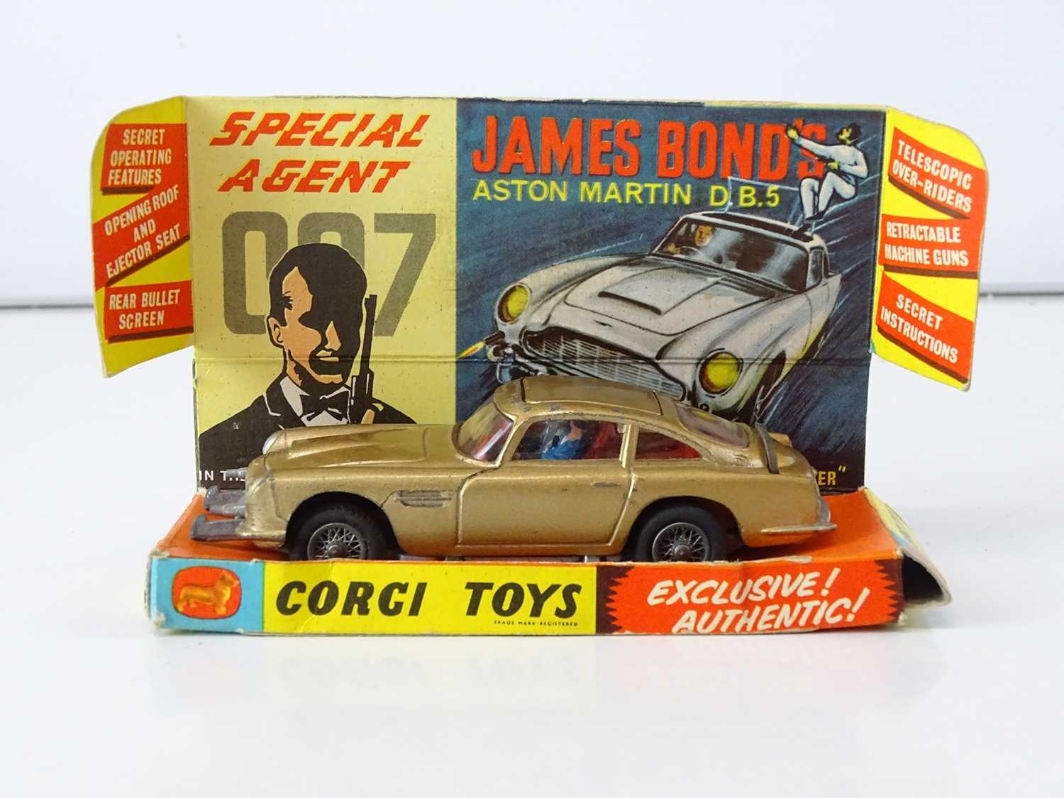A CORGI Toys 261 James Bond's Aston Martin in gold with working bullet shield, guns and ejector seat - Image 2 of 4