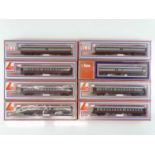 A group of LIMA HO Gauge South African Outline express passenger coaches in SAR brown/grey