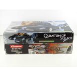A pair of James Bond Movie Tie-In Slot Racing Sets by CARRERA and MICRO SCALEXTRIC for Casino Royale