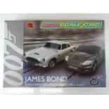 A MICRO SCALEXTRIC James Bond 007 Aston Martin Action Set - appears complete - G/VG in G box