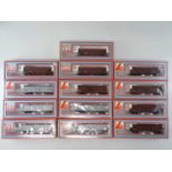 A group of South African outline HO Gauge LIMA hopper wagons and box vans as lotted - VG in G