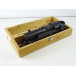 A kit built finescale O Gauge Fairburn 2-6-4 steam tank locomotive in BR weathered black livery