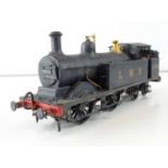 A kit built finescale O Gauge Johnson Class 3F 0-4-4 steam tank locomotive in LMS black weathered