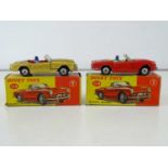 A pair of DINKY 114 Triumph Spitfires comprising examples in red and metallic gold - G in G/VG boxes