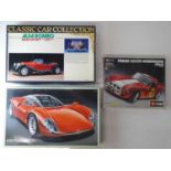A group of unbuilt 1:12/16/18 scale plastic/metal car kits, including Alfa Romeo examples by FUJIMI,
