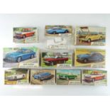 A group of five unbuilt plastic car kits by AIRFIX comprising an Aston Martin DB6 in 1:24 scale