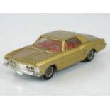 A CORGI 245 Buick Riviera in metallic gold with spoked hubs - G in G/VG box