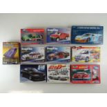 A group of unbuilt 1:32 scale plastic car kits, various examples by REVELL, MONOGRAM and others (