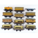 A group of HORNBY O Gauge M0 and M1 passenger coaches with two additional wagons - F unboxed (12)