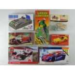 A group of mixed unbuilt plastic kits by AIRFIX and others, together with a TAMIYA radio control car