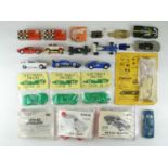 A quantity of 1:32 scale slot racing cars, bodies. kits and accessories by various manufacturers -