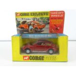 A CORGI 341 Mini Marcos GT850 in maroon - VG in G box