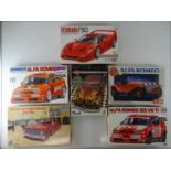 A group of unbuilt 1:24/25 scale plastic car kits, various examples by TAMIYA, AIRFIX and others (