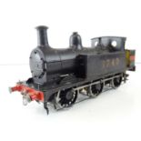 A kit built finescale O Gauge Class 1F 0-6-0 steam tank locomotive in LMS weathered black livery