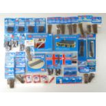 A quantity of N Gauge PECO Setrack accessories and kits, as new ex-shop stock - VG/E in VG