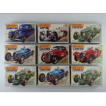 A group of unbuilt 1:32 scale plastic car kits, primarily racing examples by MATCHBOX (contents