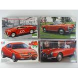 A group of unbuilt 1:24 scale plastic car kits, all Alfa Romeo examples by TAMIYA and PROTAR (