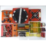 A group of mostly boxed HORNBY O Gauge clockwork track and other accessories to include 4x