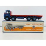 A DINKY 502 Foden Flat Truck, 1st style cab in dark blue/red/mid blue hubs - G in G box