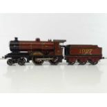 A BASSETT LOWKE O gauge clockwork "Duke of York" 4-4-0 steam locomotive numbered 1927 - F/G in G