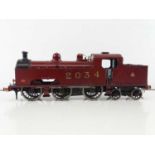 A finescale O gauge kitbuilt "Flatiron" 0-6-4 steam tank locomotive in LMS maroon numbered 2034 -