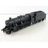 A finescale O gauge kitbuilt class 8F 2-8-0 steam locomotive in BR heavily weathered black livery