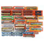 A large group of boxed and unboxed OO Gauge rolling stock by HORNBY, MAINLINE, LIMA and others - F/G