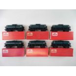 A group of HORNBY DUBLO OO gauge Caustic Liquor bogie tank wagons, some in Tony Cooper repro boxes -