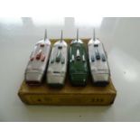 A DINKY 23S Streamlined Racing Car trade box complete with 4 examples of the model, 3 in silver with