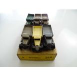 A DINKY 25A Wagon trade box complete with 6 examples of the model, 3 in brown and 1 each in grey,