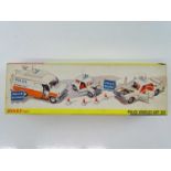 A DINKY 297 Police Vehicles Gift Set, appears complete, generally in good condition but the Mini has