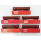 A group of HORNBY DUBLO OO gauge Super Detail corridor coaches in BR maroon, some in Tony Cooper