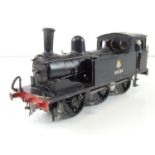 A finescale O gauge kitbuilt class J71 0-6-0 steam tank locomotive in BR black livery numbered 68234